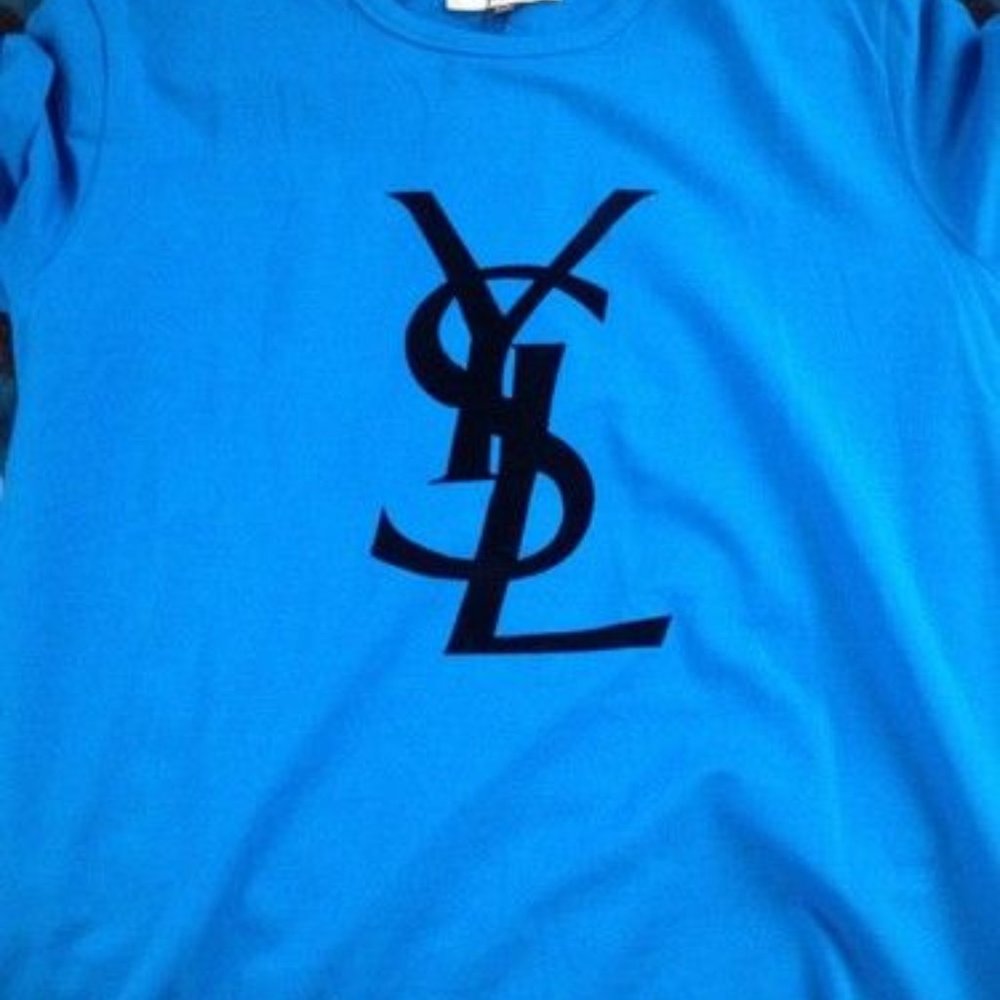 Womens blue YSL shirt in a medium rare and discont
